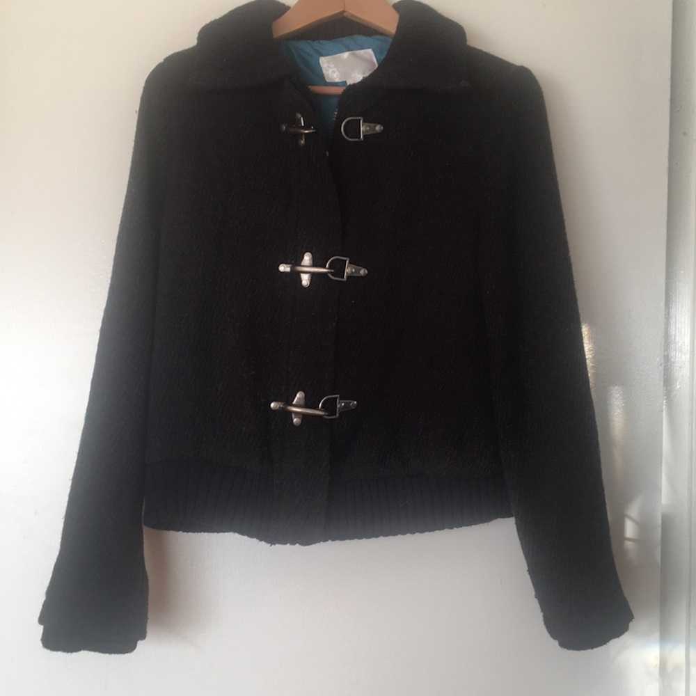 Fully lined jacket with zipper AND 3 clasp front
